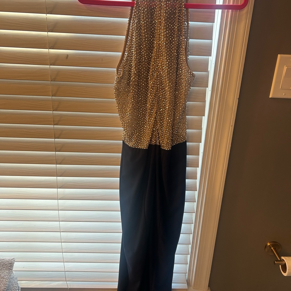 Elegant Black and Gold Sleeveless Dress